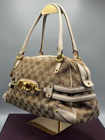 GUCCI - GG supreme bit canvas handbag.

Made...