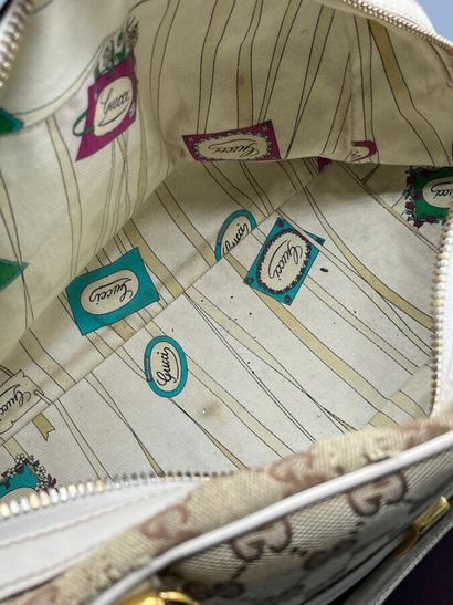 GUCCI - GG supreme bit canvas handbag.

Made...