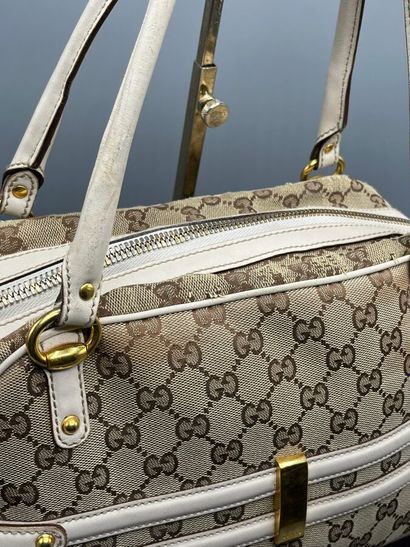 GUCCI - GG supreme bit canvas handbag.

Made...