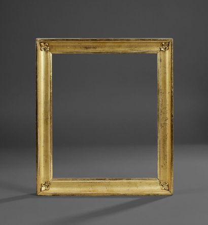 Molded wood and gilded stucco frame, decorated...