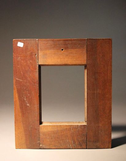 Walnut frame richly carved with accanthus...