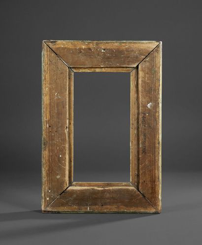 Frame in molded wood and gilded stucco, decorated...