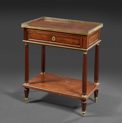 Mahogany writing table opening with a front...