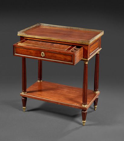 Mahogany writing table opening with a front...