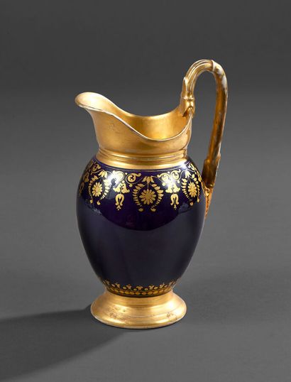 Paris porcelain jug with blue and gilt decoration...