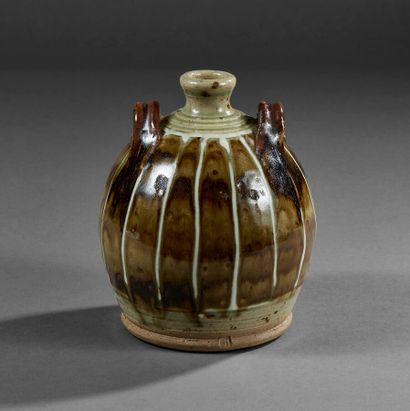 Two-handled flask in water-green glazed stoneware...