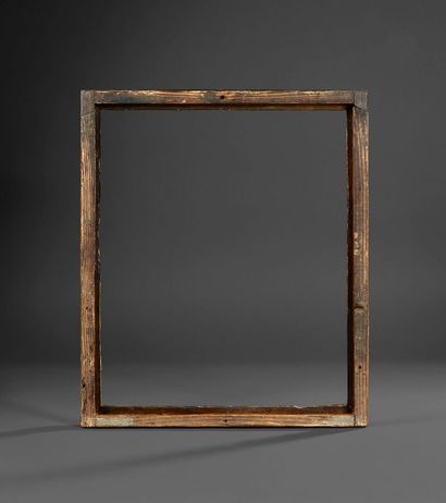 Bérain molded and carved wood frame decorated...