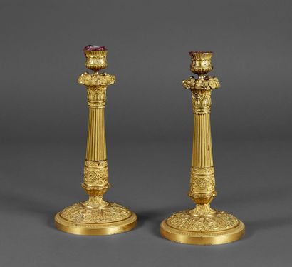 Pair of chased ormolu torches decorated with...