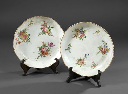 Pair of porcelain soup plates with polychrome...