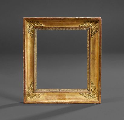 Molded wood frame, stuccoed and gilded, decorated...