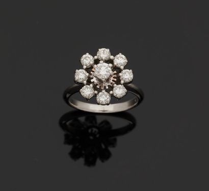 18k (750 thousandths) white gold ring set...