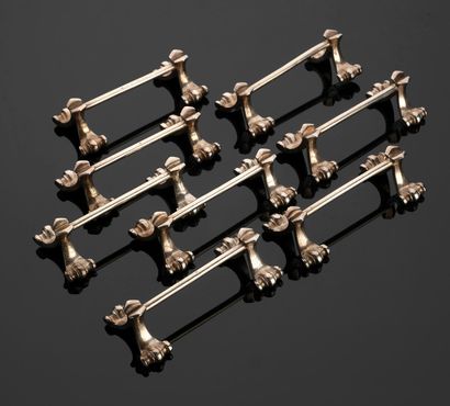 Suite of eight knife-holders in 925-thousandths...