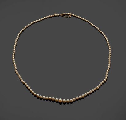 A necklace of tumbling cultured pearls, the...