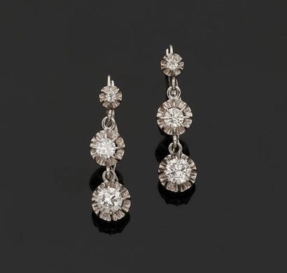 Pair of 18k (750 thousandths) white gold...