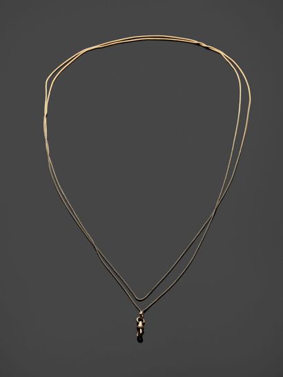 Double watch chain in 18k (750 thousandths)...