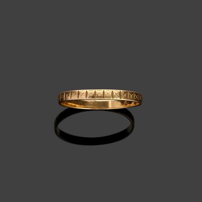 Wedding band in 18k (750 thousandths) yellow...