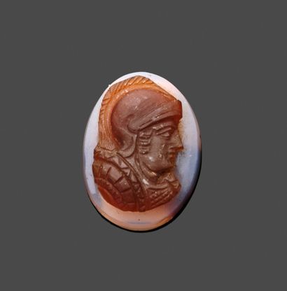 Carved agate cameo depicting a male bust...