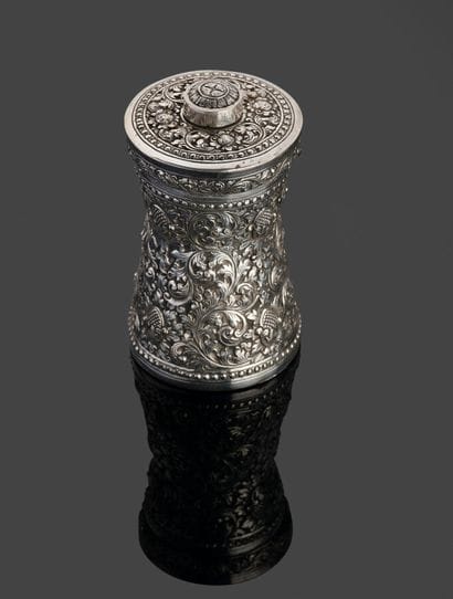 Silver and metal pepper mill on wooden core...