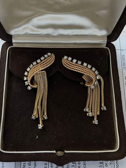 Pair of cord earrings in 18k (750 thousandths)...