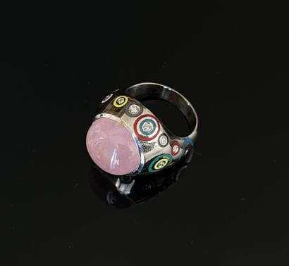 White gold ring set with a pink sapphire...