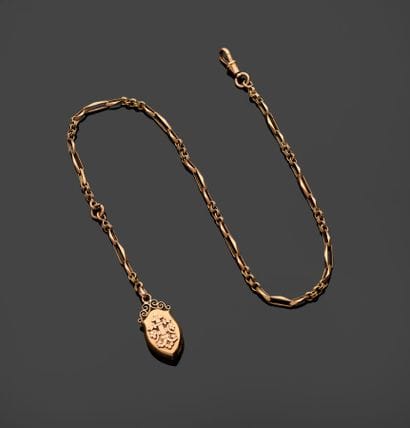 Reliquary pendant and watch chain in 18k...