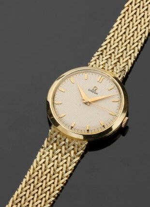 OMEGA - Men's round watch in 18k (750 thousandths)...