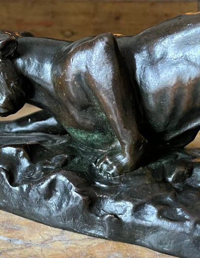 Brown patina bronze sculpture of a panther...