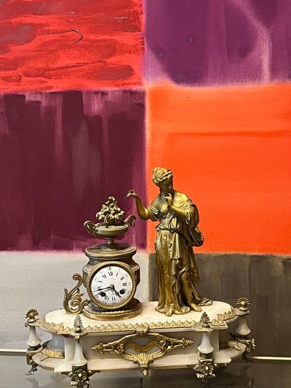 Chased ormolu clock featuring an antique...
