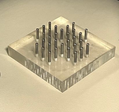 Plexiglass solitaire game with metal tokens...
