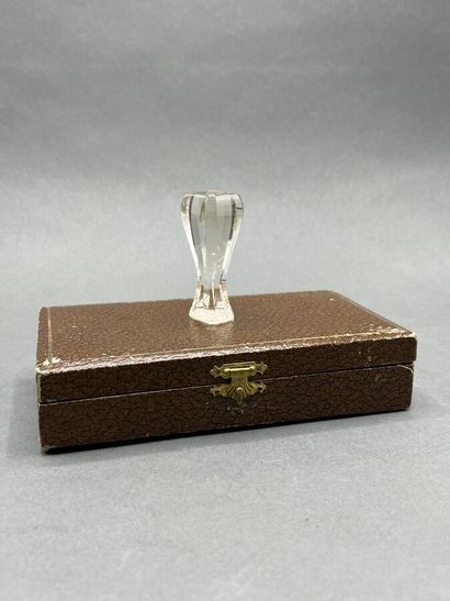 Glass seal engraved with an armorial shield...