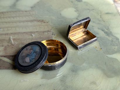 Two 925-millimeter silver boxes, one quadrangular...
