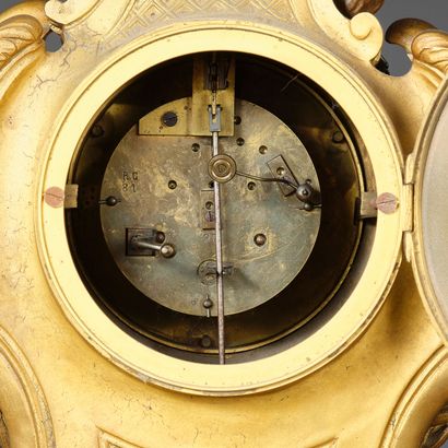 Large Rococo-style clock in chased and gilded...