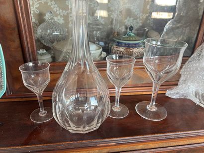 Set of crystal stemmed glasses and 4 carafes...