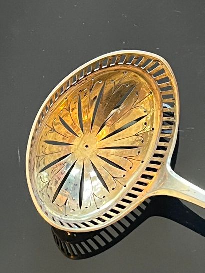 Vermeil sprinkling spoon, the spoon openwork...