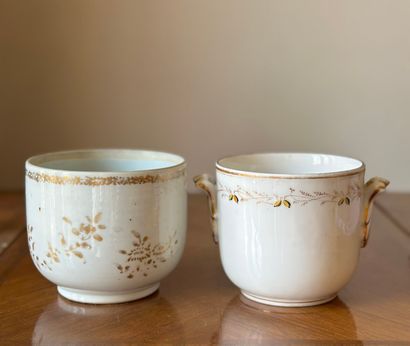 Two enameled porcelain pots with gilded flowers...