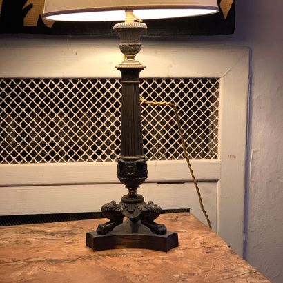 Empire-style tripod candlestick in brown...
