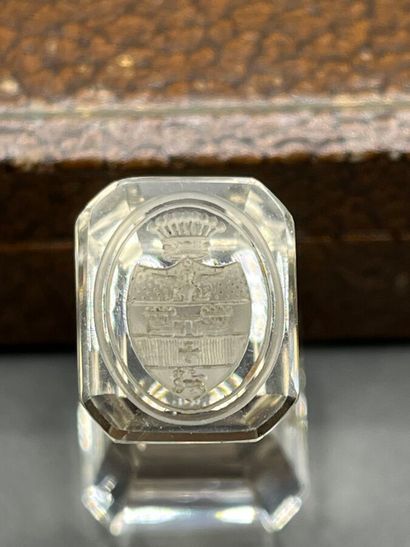 Glass seal engraved with an armorial shield...