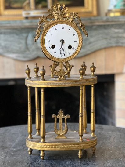 Gilt bronze portico clock decorated with...
