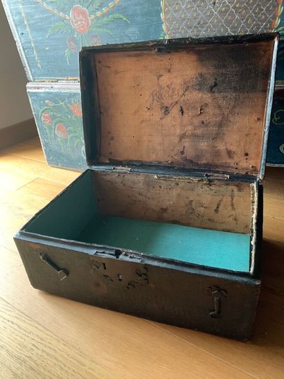 Wooden case covered with embossed leather,...