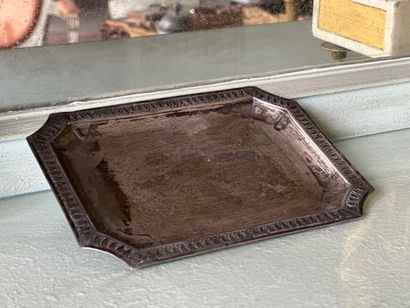 Rectangular tray with truncated angles in...