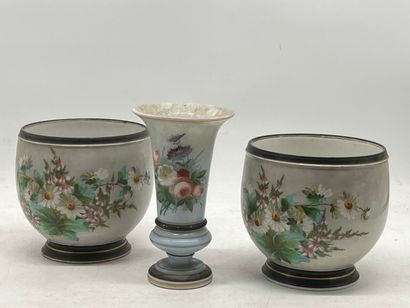 A pair of porcelain flower-pot holders. A...