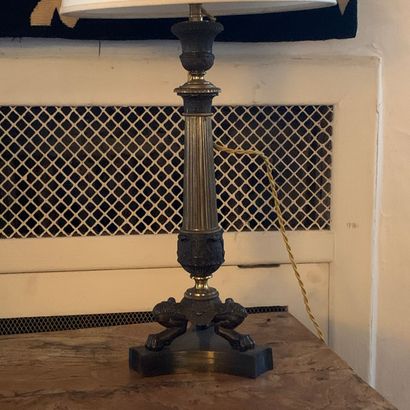 Empire-style tripod candlestick in brown...