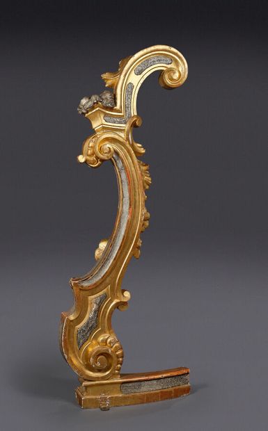 Carved and gilded wood ornamentation in the...