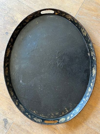 Oval tray in black and gold painted sheet...