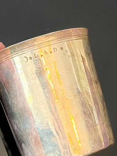 Silver tumbler decorated with filets engraved...