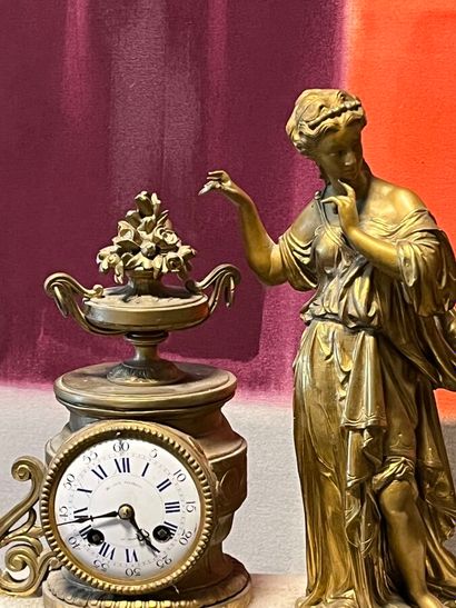 Chased ormolu clock featuring an antique...