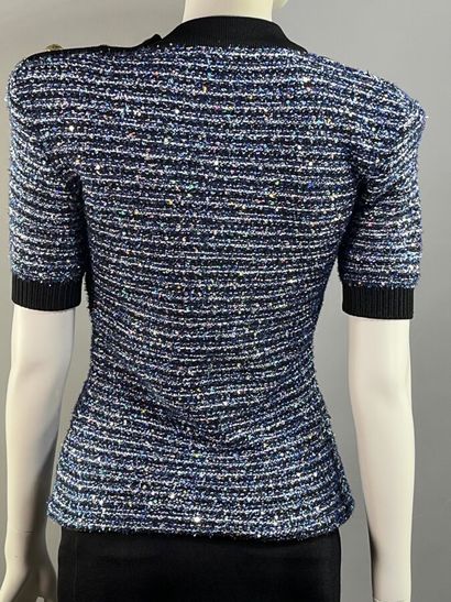 BALMAIN Paris.

Pull à manches courtes réalisé...