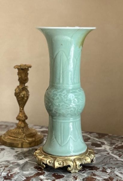 Celadon-glazed porcelain cone-shaped vase,...