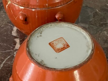 Two enameled porcelain covered pots with...