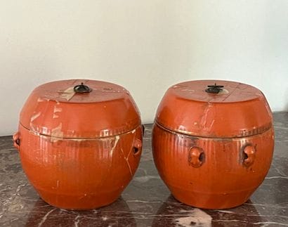 Two enameled porcelain covered pots with...